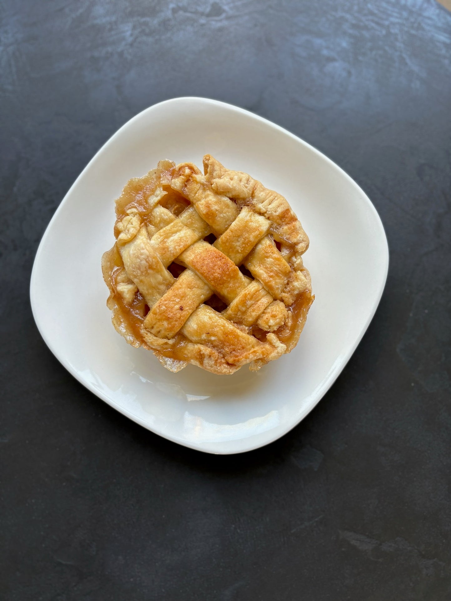 Buttery rustic lattice crust caramelized by the rich caramel apple filling.